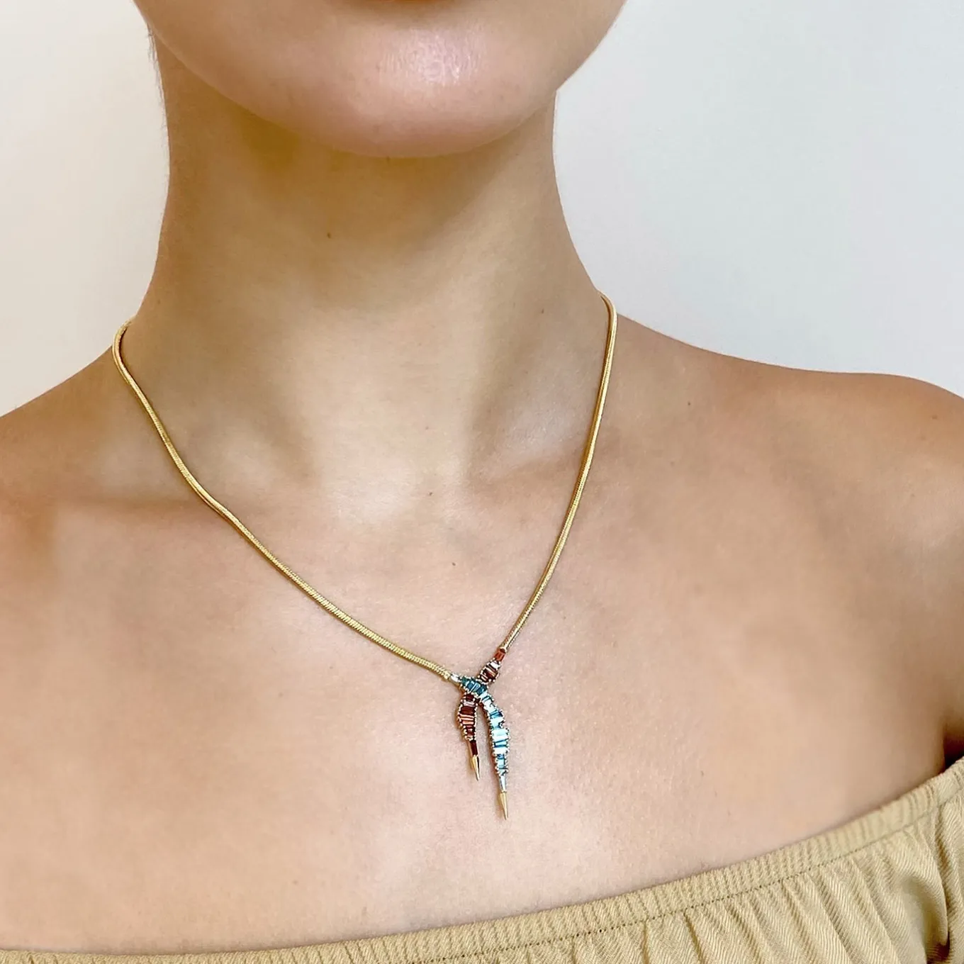 ruched_lariat_necklace__a_1.webp Ruched Lariat Necklace - Aquamarine & Spinel